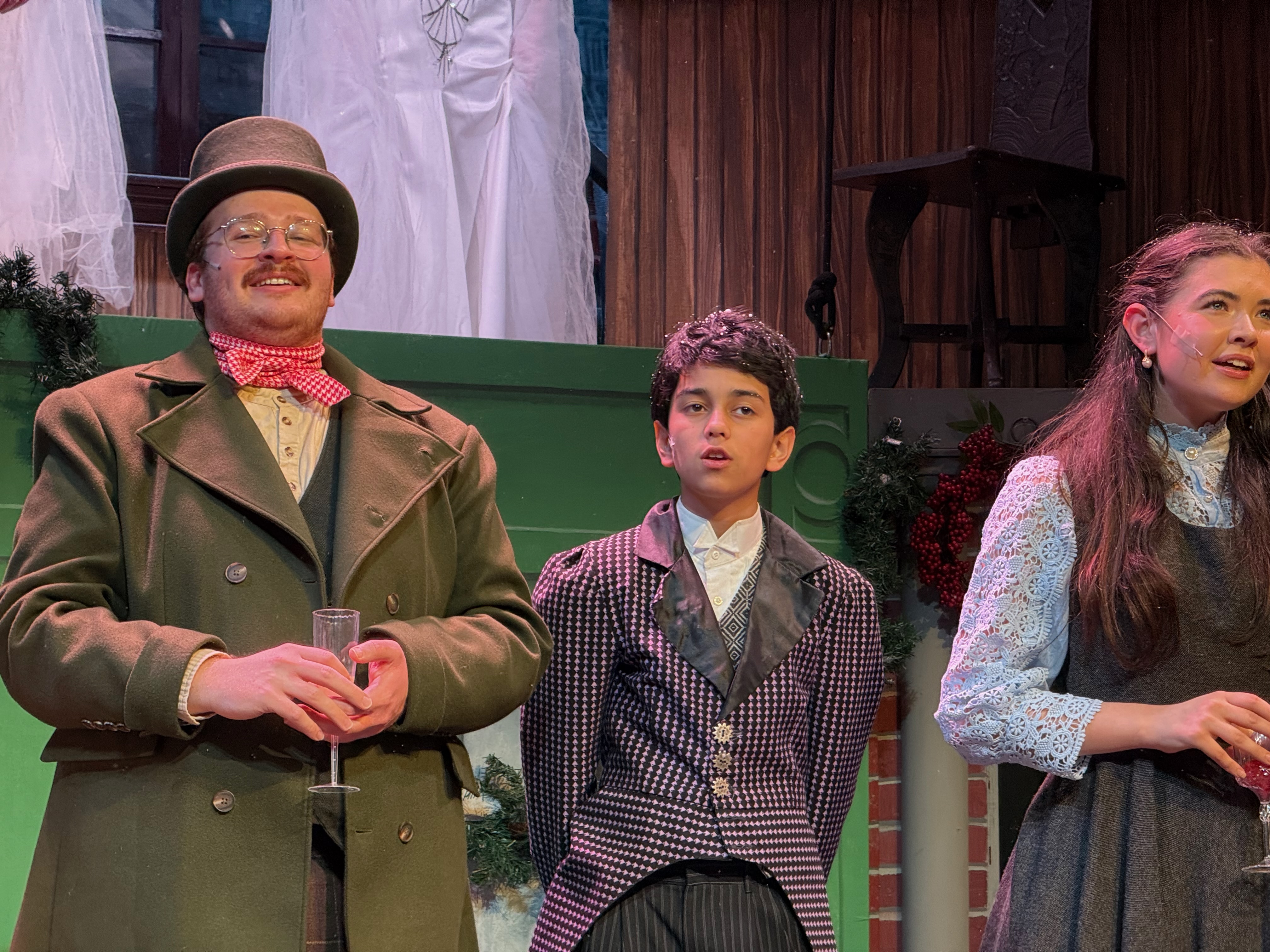 Fitz in Victorian costume with two adult actors